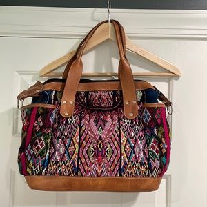 Embroidered shoulder carpet bag